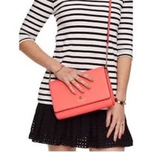 Kate Spade crossbody bag in peachy "guava" color.